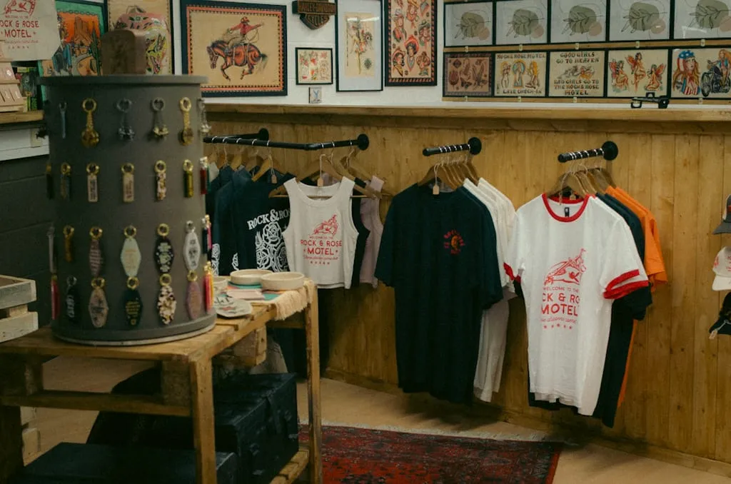 The Store with t-shirts and keyrings on display